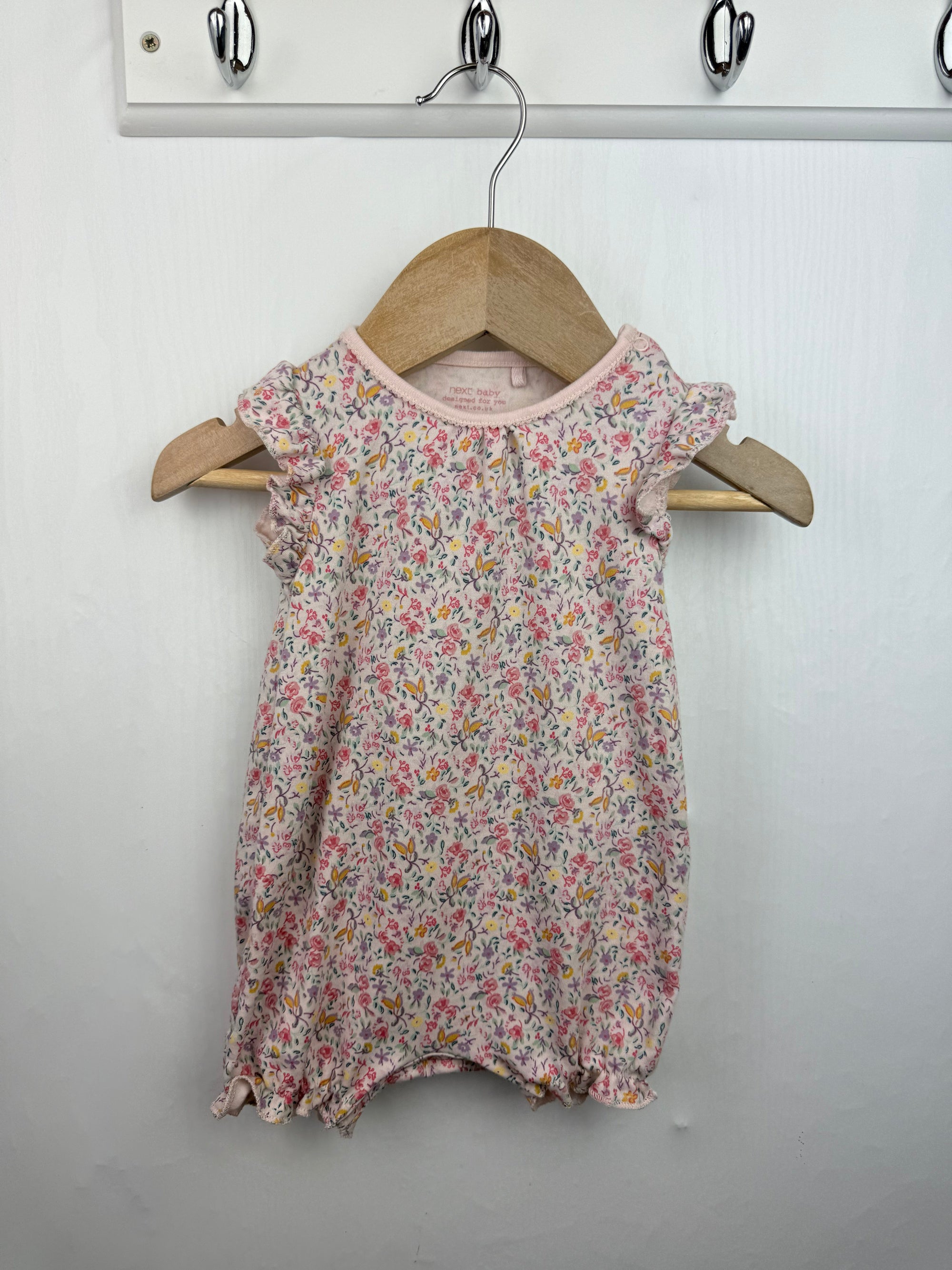 Next Pink Floral Romper - Baby Girls 0 - 3 Months - Little Ones Preloved. Second Hand Children's & Preloved Baby, Kids, Girls & Boys Clothes. UK online