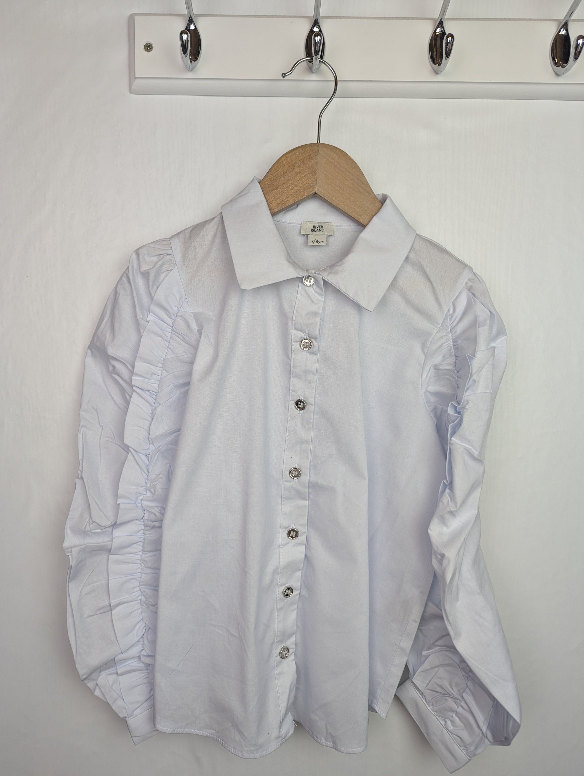 NWOT's River Island Ruffle Sleeve Shirt - Girls 7 - 8 Years - Little Ones Preloved. Second Hand Children's & Preloved Baby, Kids, Girls & Boys Clothes. UK online