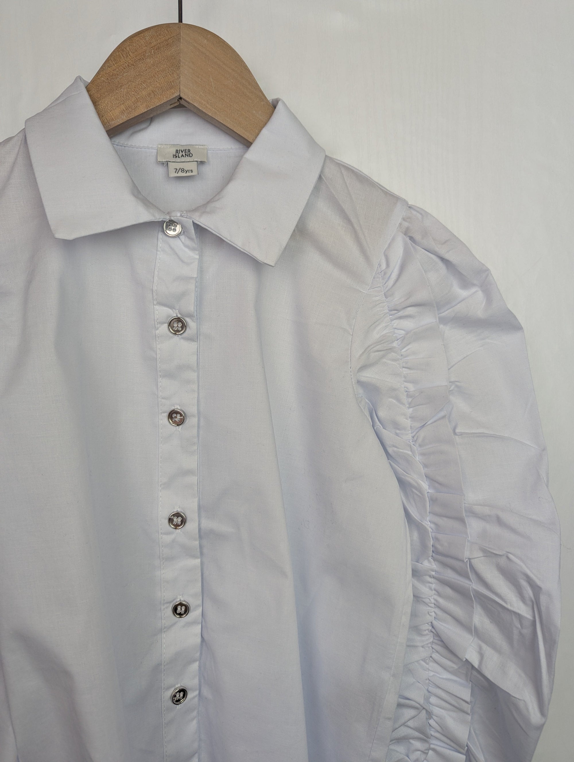 NWOT's River Island Ruffle Sleeve Shirt - Girls 7 - 8 Years - Little Ones Preloved. Second Hand Children's & Preloved Baby, Kids, Girls & Boys Clothes. UK online