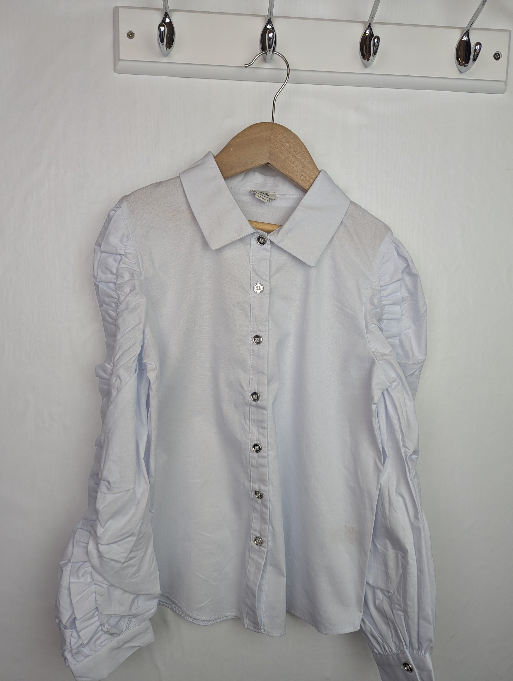 NWOT's River Island Ruffle Sleeve Shirt - Girls 9 - 10 Years - Little Ones Preloved. Second Hand Children's & Preloved Baby, Kids, Girls & Boys Clothes. UK online