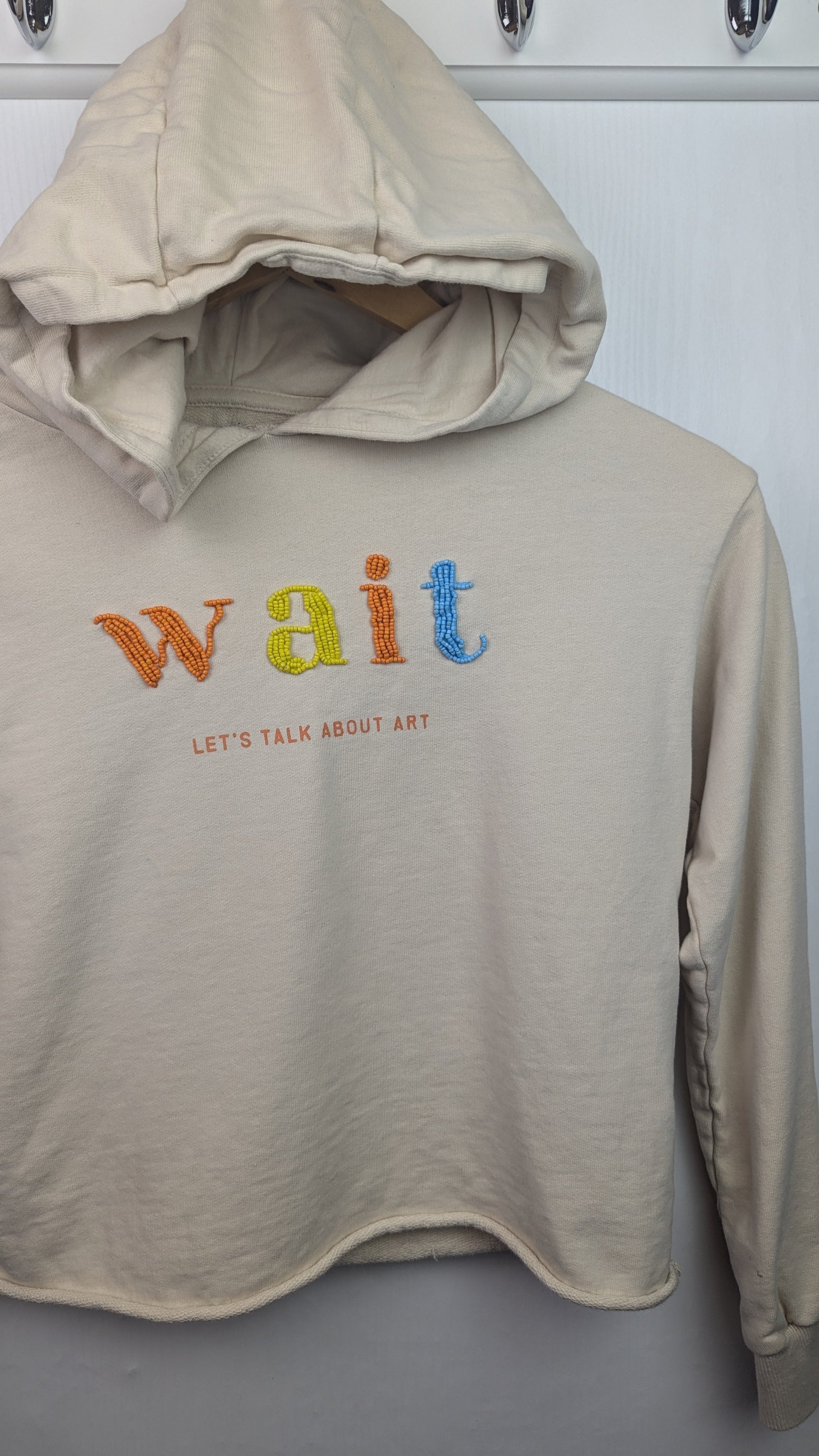 Reserved Beige 'Lets talk about Art' Jumper - Girls 10 - 11 Years - Little Ones Preloved. Second Hand Children's & Preloved Baby, Kids, Girls & Boys Clothes. UK online