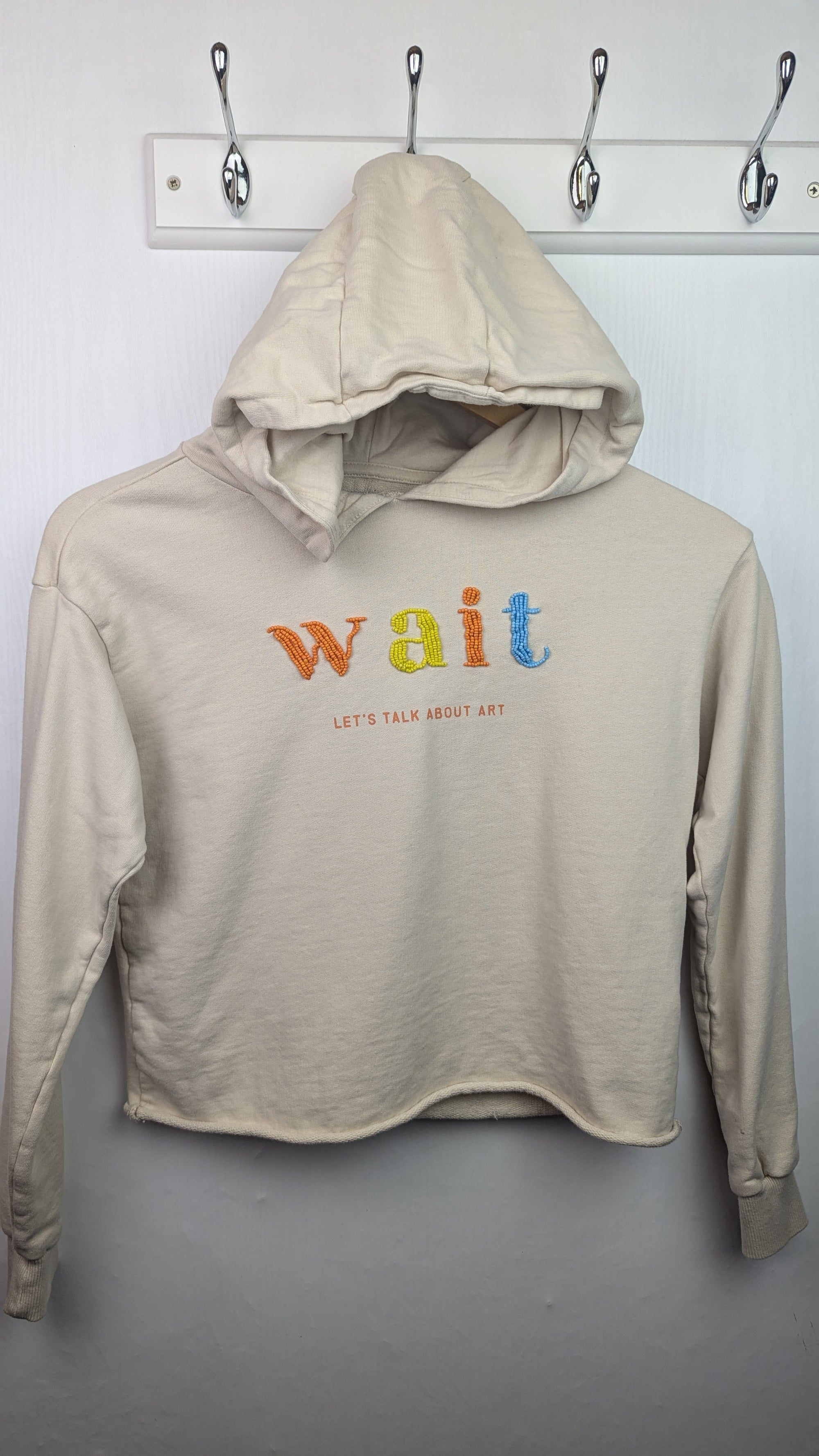 Reserved Beige 'Lets talk about Art' Jumper - Girls 10 - 11 Years - Little Ones Preloved. Second Hand Children's & Preloved Baby, Kids, Girls & Boys Clothes. UK online