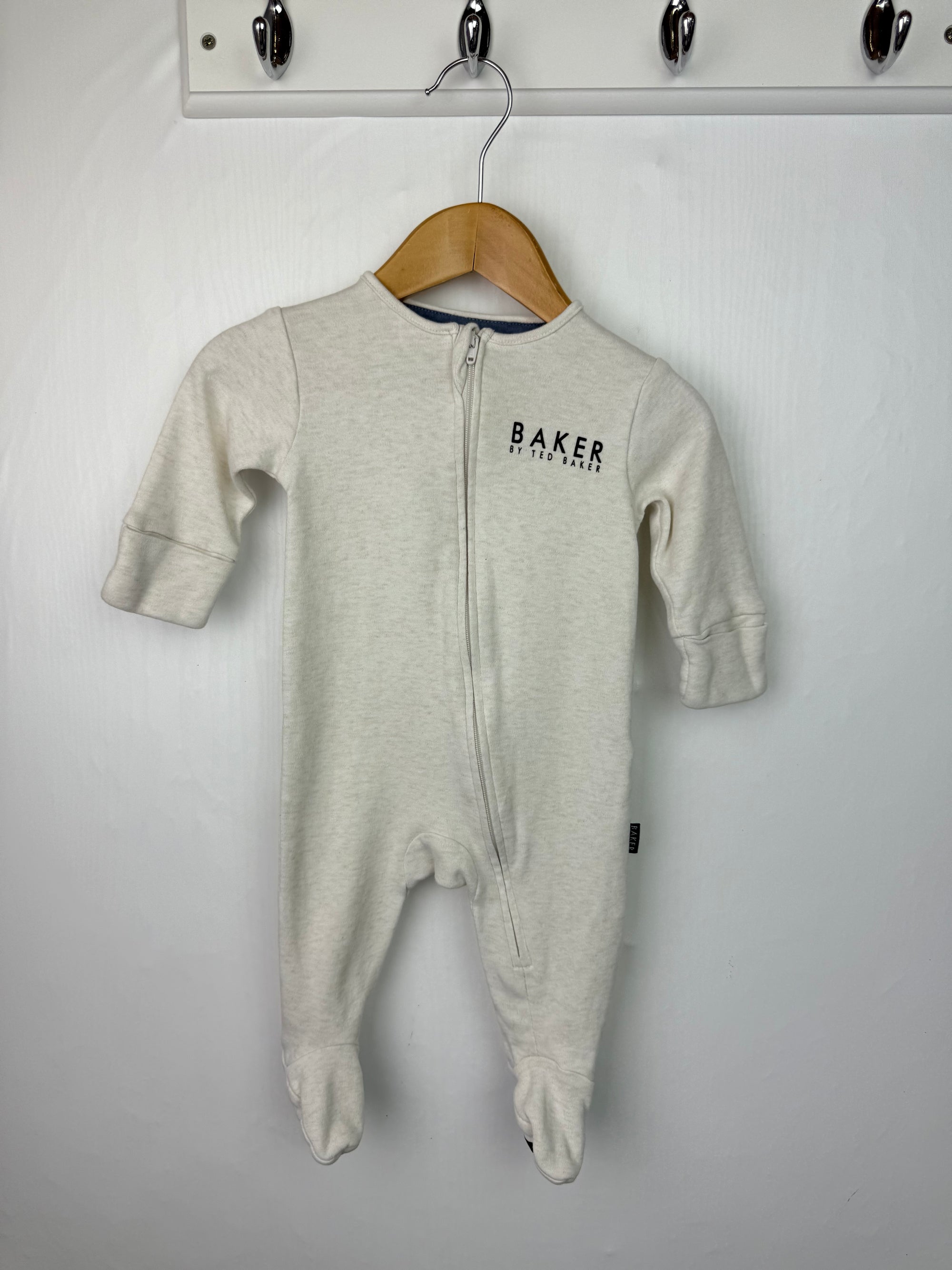 Ted Baker Cream Zip Sleepsuit - Unisex 0-3 Months Little Ones Preloved. Preloved Kids & Children’s Gently Used Clothing. Second Hand Baby, Girls & Boys Clothes. UK Postage