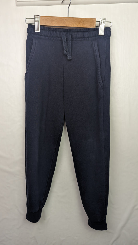 M&S Navy Joggers 6-7y Marks & Spencer Used, Preloved, Preworn & Second Hand Baby, Kids & Children's Clothing UK Online. Cheap affordable. Brands including Next, Joules, Nutmeg, TU, F&F, H&M.