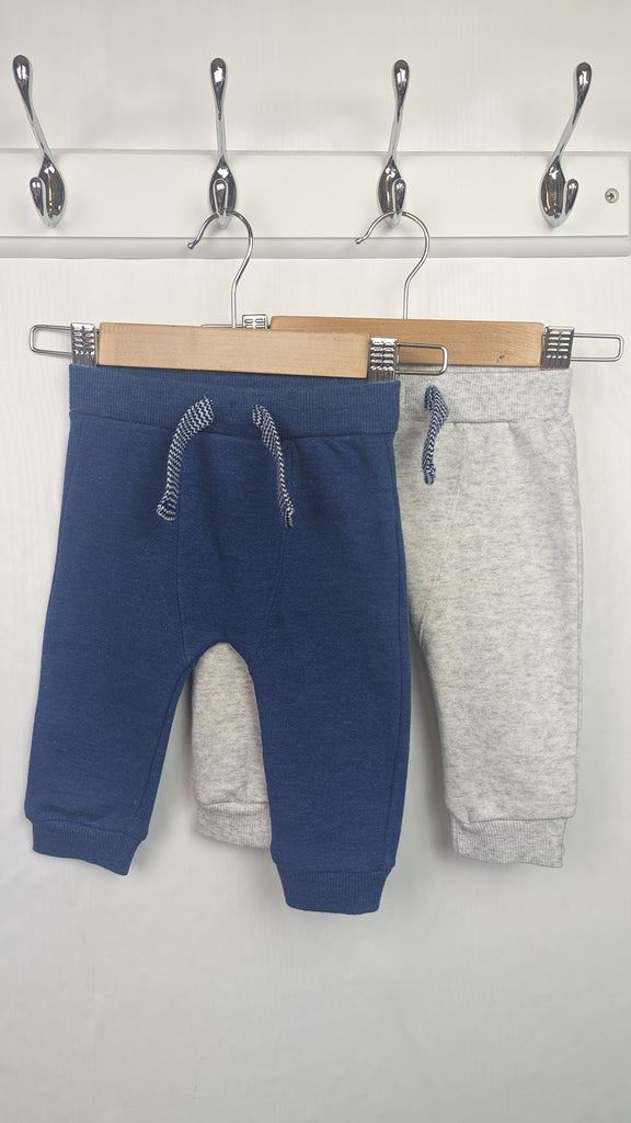 F&F Blue & Grey Jogging Bottoms - Boys 3-6 Months F&F Used, Preloved, Preworn & Second Hand Baby, Kids & Children's Clothing UK Online. Cheap affordable. Brands including Next, Joules, Nutmeg, TU, F&F, H&M.