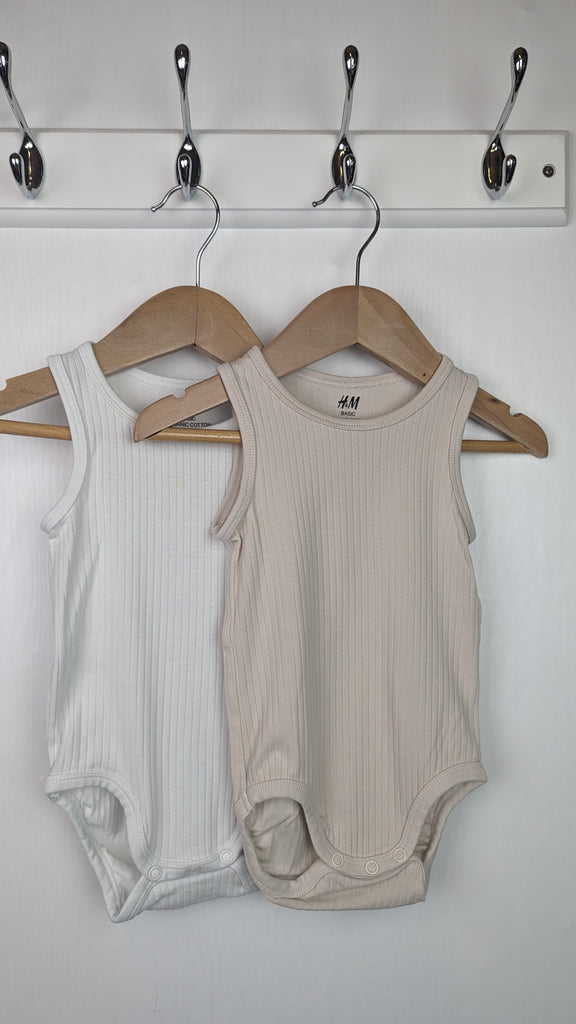 H&M Cream & Beige Ribbed Bodysuits - Unisex 6-9 Months Little Ones Preloved Used, Preloved, Preworn & Second Hand Baby, Kids & Children's Clothing UK Online. Cheap affordable. Brands including Next, Joules, Nutmeg Morrisons, TU, F&F, H&M.