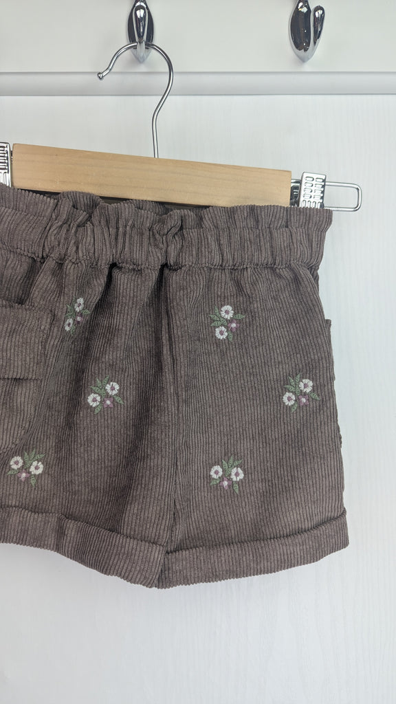 Nutmeg Brown Floral Cord Shorts - Girls 12-18 Months Nutmeg Used, Preloved, Preworn & Second Hand Baby, Kids & Children's Clothing UK Online. Cheap affordable. Brands including Next, Joules, Nutmeg Morrisons, TU, F&F, H&M.