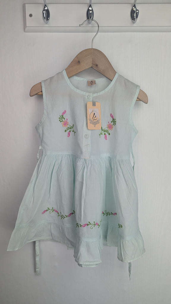 Alam Light Green Floral Dress - Girls 18 Months Alam's Used, Preloved, Preworn & Second Hand Baby, Kids & Children's Clothing UK Online. Cheap affordable. Brands including Next, Joules, Nutmeg Morrisons, TU, F&F, H&M.