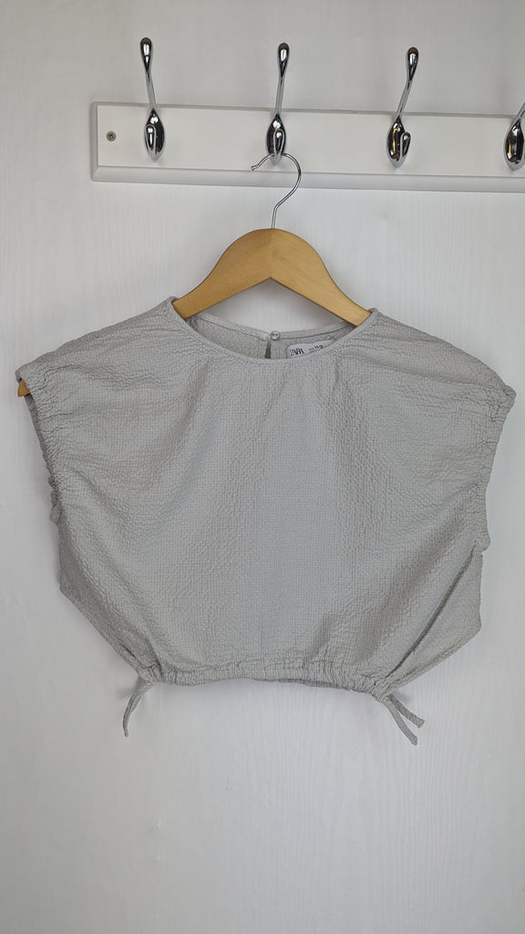 Zara Grey Crop Top - Girls 11-12 Years Zara Used, Preloved, Preworn & Second Hand Baby, Kids & Children's Clothing UK Online. Cheap affordable. Brands including Next, Joules, Nutmeg Morrisons, TU, F&F, H&M.