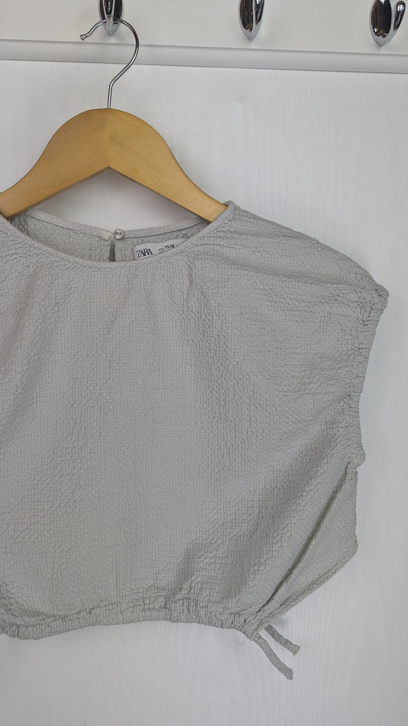 Zara Grey Crop Top - Girls 11-12 Years Zara Used, Preloved, Preworn & Second Hand Baby, Kids & Children's Clothing UK Online. Cheap affordable. Brands including Next, Joules, Nutmeg Morrisons, TU, F&F, H&M.