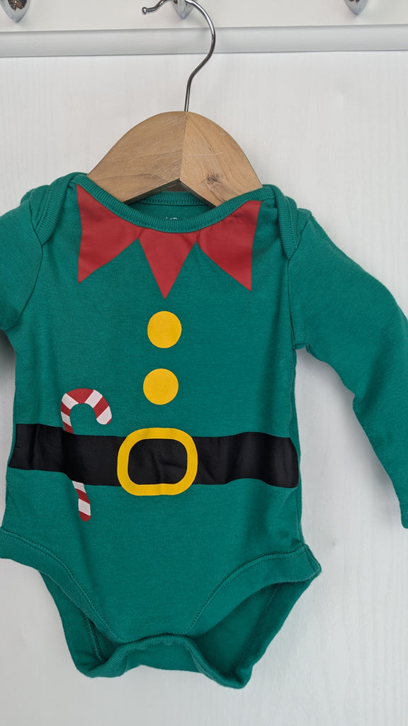 F&F Green Christmas Elf Bodysuit - Unisex Baby 3-6 Months F&F Used, Preloved, Preworn & Second Hand Baby, Kids & Children's Clothing UK Online. Cheap affordable. Brands including Next, Joules, Nutmeg Morrisons, TU, F&F, H&M.