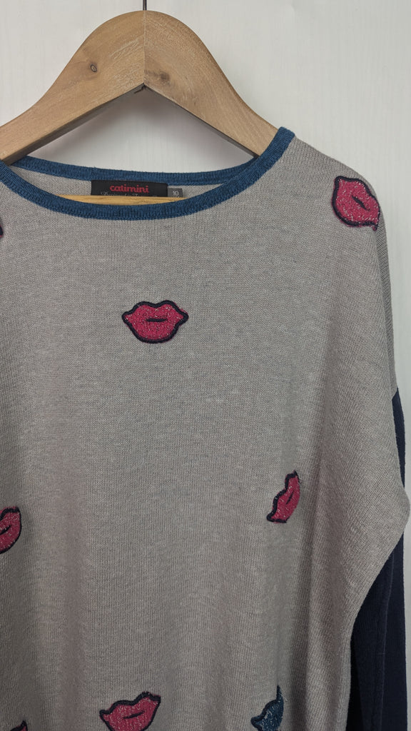 Catimini Pink Lips Jumper - Girls 10 Years Catimini Used, Preloved, Preworn & Second Hand Baby, Kids & Children's Clothing UK Online. Cheap affordable. Brands including Next, Joules, Nutmeg Morrisons, TU, F&F, H&M.