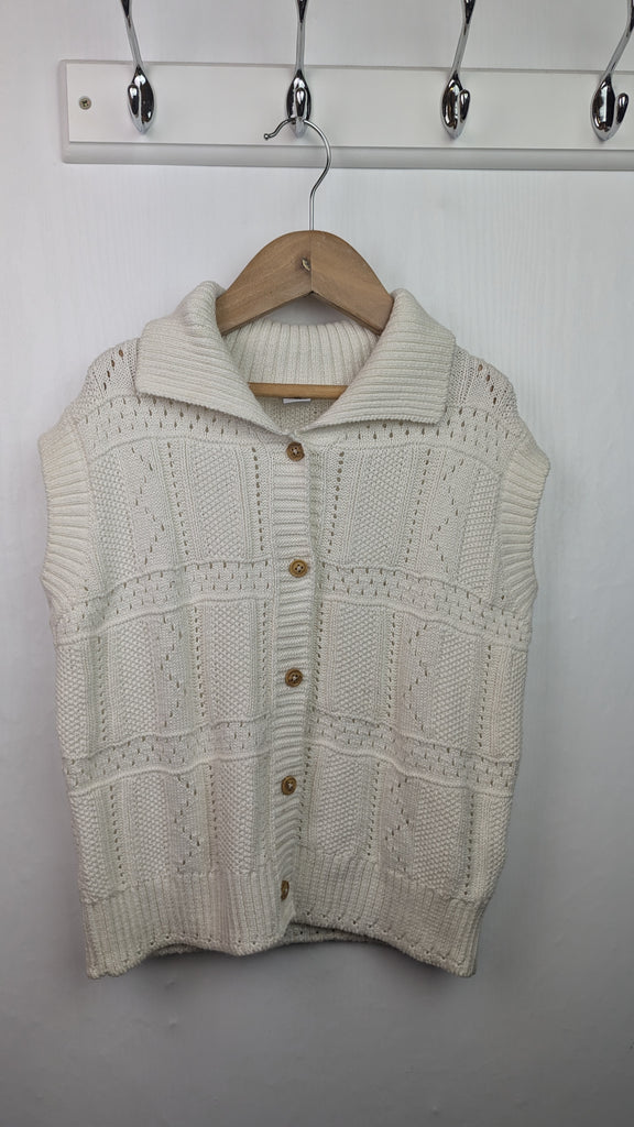 TU Cream Sleeveless Knit Cardigan - Girls 6 Years Little Ones Preloved Used, Preloved, Preworn & Second Hand Baby, Kids & Children's Clothing UK Online. Cheap affordable. Brands including Next, Joules, Nutmeg Morrisons, TU, F&F, H&M.