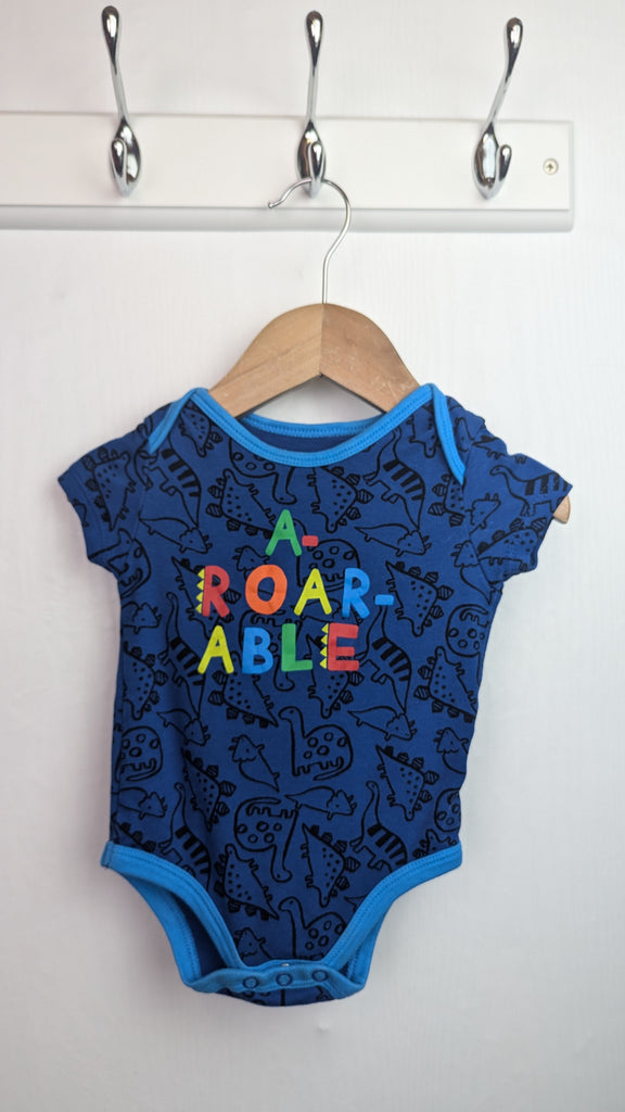 Pep & Co Blue Dinosaur Bodysuit - Boys 6-9 Months Little Ones Preloved Used, Preloved, Preworn & Second Hand Baby, Kids & Children's Clothing UK Online. Cheap affordable. Brands including Next, Joules, Nutmeg Morrisons, TU, F&F, H&M.