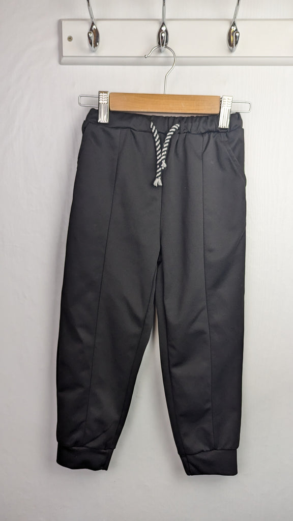 Shein Black Jogging Bottoms - Boys 5 Years Little Ones Preloved Used, Preloved, Preworn & Second Hand Baby, Kids & Children's Clothing UK Online. Cheap affordable. Brands including Next, Joules, Nutmeg Morrisons, TU, F&F, H&M.