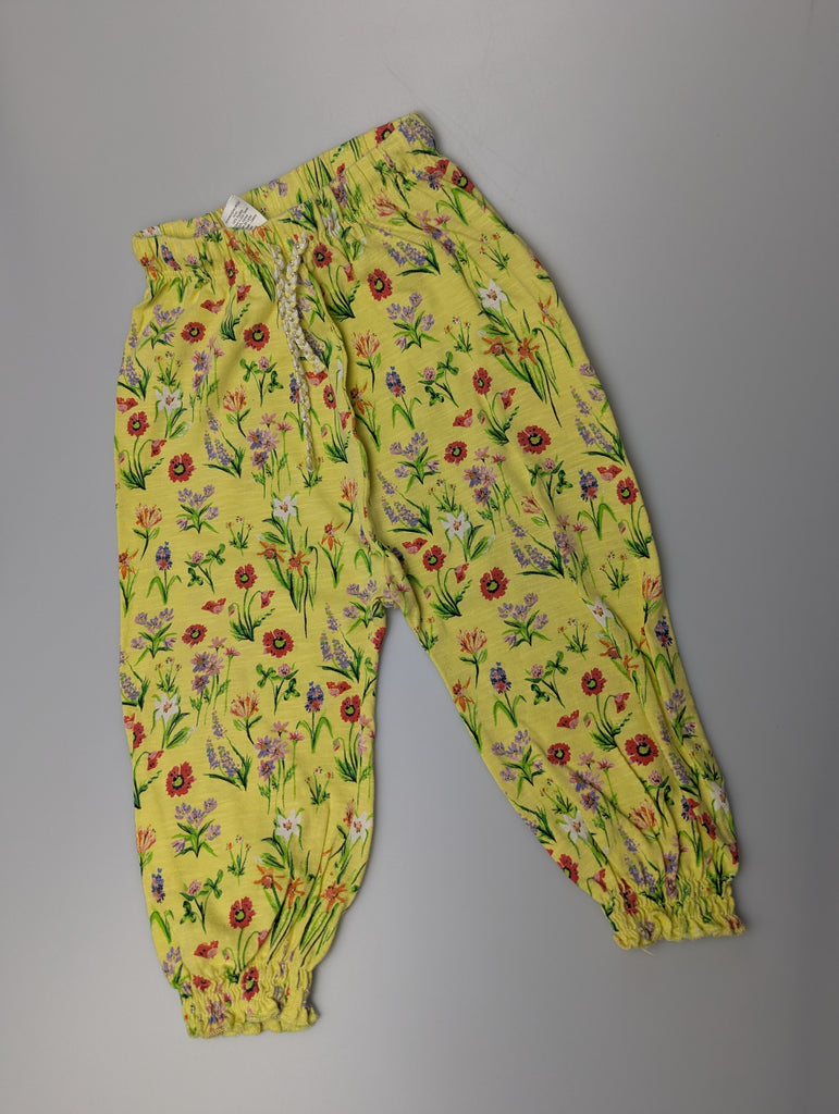 Next Yellow Floral Trousers - Girls 12-18 Months Little Ones Preloved Used, Preloved, Preworn Baby, Girls & Boys Clothes. Kids & Children's second hand Clothing UK Online. Cheap affordable. Brands including Next, Joules, Nutmeg Morrisons, TU, F&F, H&M.