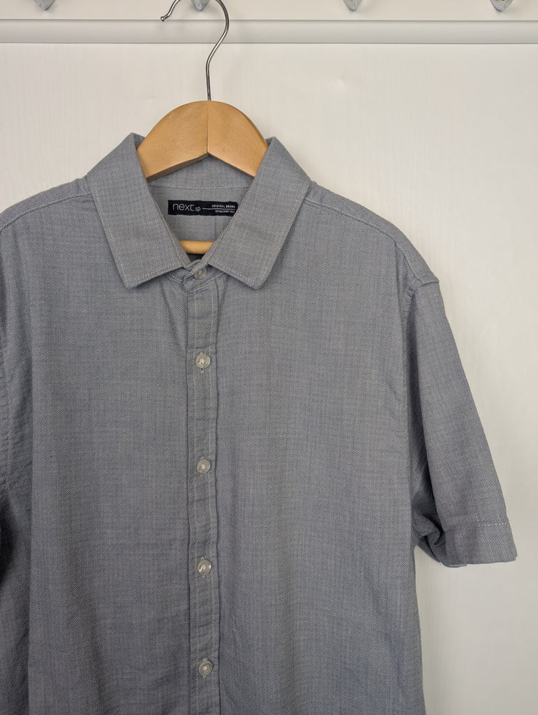 Next Grey Short Sleeve Shirt - Boys 12 Years Little Ones Preloved Used, Preloved, Preworn Baby, Girls & Boys Clothes. Kids & Children's second hand Clothing UK Online. Cheap affordable. Brands including Next, Joules, Nutmeg Morrisons, TU, F&F, H&M.