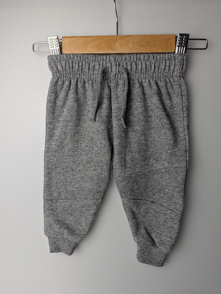 Primark Grey Jogging Bottoms - Boys 6-9 Months Little Ones Preloved Used, Preloved, Preworn Baby, Girls & Boys Clothes. Kids & Children's second hand Clothing UK Online. Cheap affordable. Brands including Next, Joules, Nutmeg Morrisons, TU, F&F, H&M.