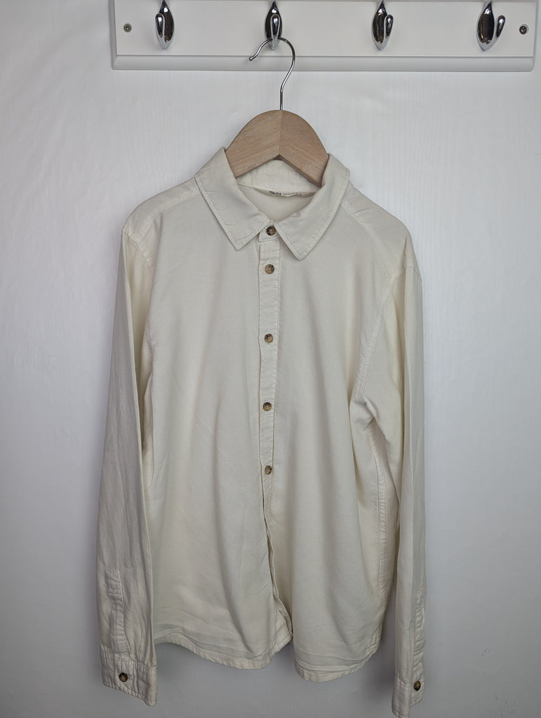 H&M Cream 100% Cotton Shirt - Boys 9-10 Years Little Ones Preloved Used, Preloved, Preworn Baby, Girls & Boys Clothes. Kids & Children's second hand Clothing UK Online. Cheap affordable. Brands including Next, Joules, Nutmeg Morrisons, TU, F&F, H&M.