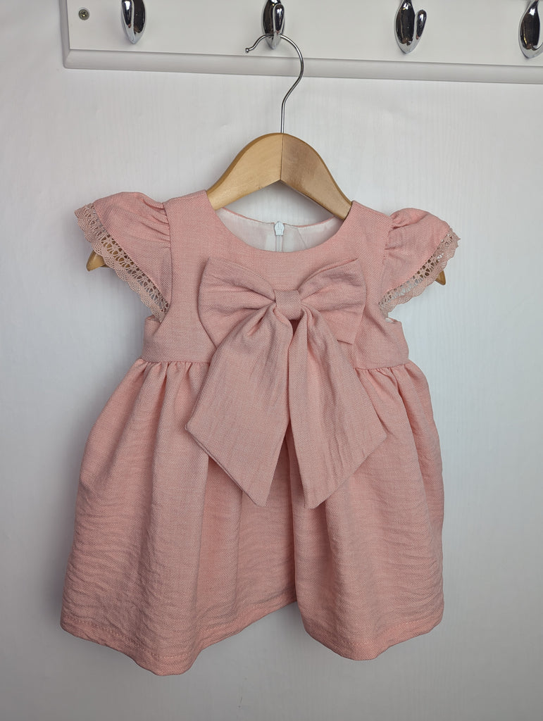 Unbranded Pink Bow Dress - Girls 3-6 Months Little Ones Preloved Used, Preloved, Preworn Baby, Girls & Boys Clothes. Kids & Children's second hand Clothing UK Online. Cheap affordable. Brands including Next, Joules, Nutmeg Morrisons, TU, F&F, H&M.