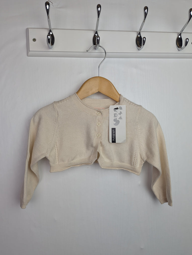 NWT's M&S Cream Cardigan - Girls 6-9 Months Little Ones Preloved Used, Preloved, Preworn Baby, Girls & Boys Clothes. Kids & Children's second hand Clothing UK Online. Cheap affordable. Brands including Next, Joules, Nutmeg Morrisons, TU, F&F, H&M.