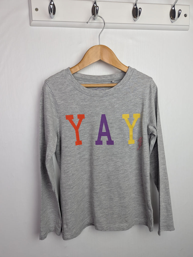 Next Grey Yay Top - Girls 7 Years Little Ones Preloved Used, Preloved, Preworn Baby, Girls & Boys Clothes. Kids & Children's second hand Clothing UK Online. Cheap affordable. Brands including Next, Joules, Nutmeg Morrisons, TU, F&F, H&M.