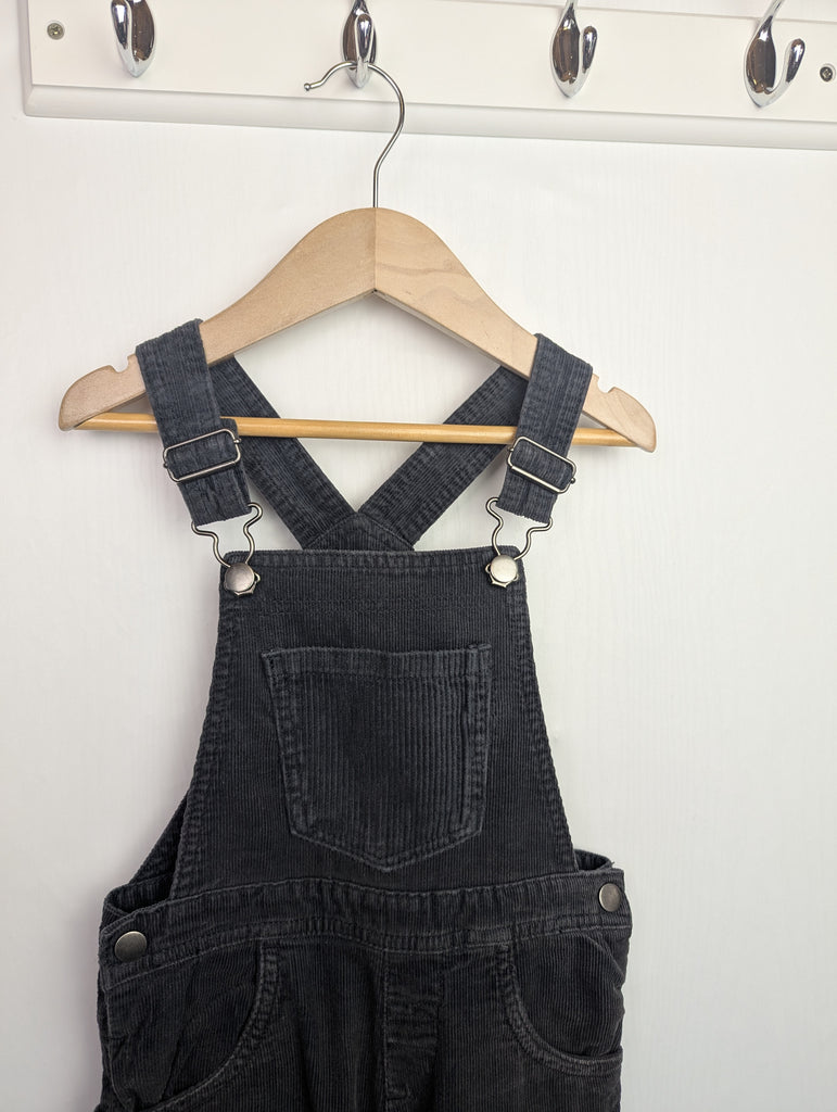 Nutmeg Grey Cord Dungarees - Unisex 2-3 Years Little Ones Preloved Used, Preloved, Preworn Baby, Girls & Boys Clothes. Kids & Children's second hand Clothing UK Online. Cheap affordable. Brands including Next, Joules, Nutmeg Morrisons, TU, F&F, H&M.