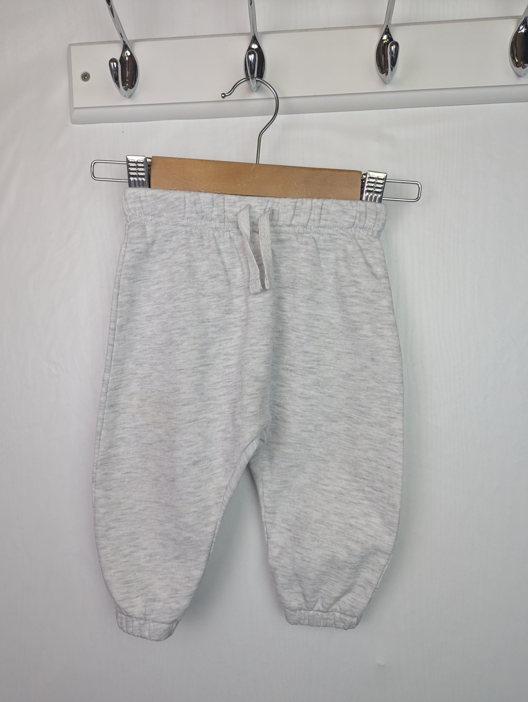 George Grey Jogging Bottoms - Unisex 6-9 Months Little Ones Preloved. Preloved Kids & Children’s Gently Used Clothing. Second Hand Baby, Girls & Boys Clothes. UK Postage