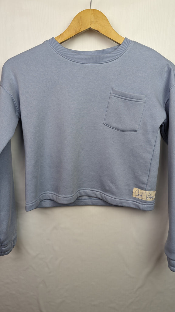 Blue Good Vibes Crop Jumper 10-11y Nutmeg Used, Preloved, Preworn & Second Hand Baby, Kids & Children's Clothing UK Online. Cheap affordable. Brands including Next, Joules, Nutmeg Morrisons, TU, F&F, H&M.