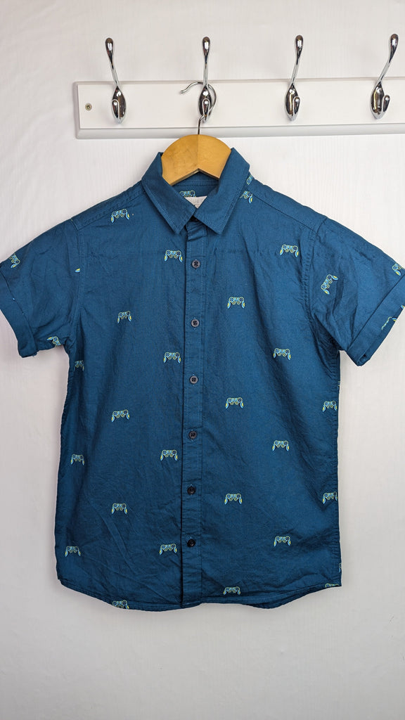 Blue Zoo Cotton Navy Gamer Shirt - Boys 11 Years Little Ones Preloved Used, Preloved, Preworn Baby, Girls & Boys Clothes. Kids & Children's second hand Clothing UK Online. Cheap affordable. Brands including Next, Joules, Nutmeg Morrisons, TU, F&F, H&M.