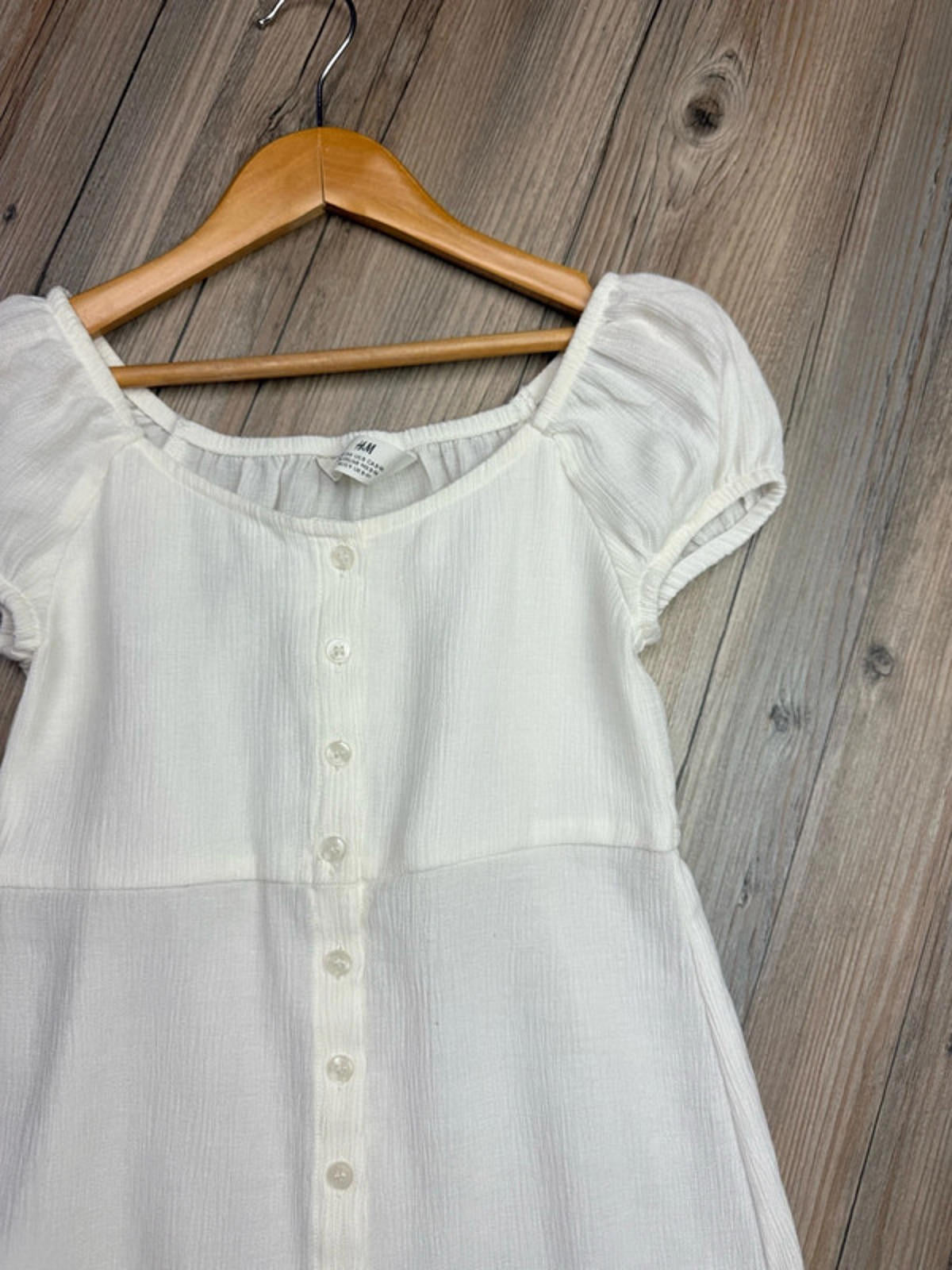 H&M Cream Viscose Mix Button Dress - Girls 8-9 Years Little Ones Preloved. Preloved Kids & Children’s Gently Used Clothing. Second Hand Baby, Girls & Boys Clothes. UK Postage