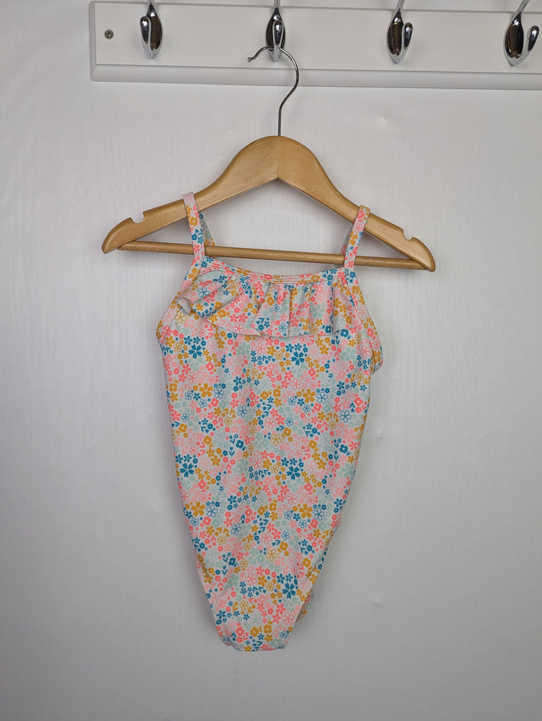 Dacthlon Floral Swimsuit - Girls 3-4 Years Little Ones Preloved Used, Preloved, Preworn Baby, Girls & Boys Clothes. Kids & Children's second hand Clothing UK Online. Cheap affordable. Brands including Next, Joules, Nutmeg Morrisons, TU, F&F, H&M.