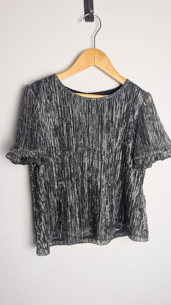 F&F Black & Silver Cropped Top - Girls 7-8 Years Little Ones Preloved Used, Preloved, Preworn & Second Hand Baby, Kids & Children's Clothing UK Online. Cheap affordable. Brands including Next, Joules, Nutmeg Morrisons, TU, F&F, H&M.