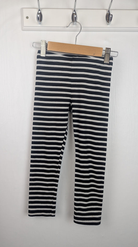 F&F Black/White/Silver Striped Leggings - Girls 4-5 Years Little Ones Preloved Used, Preloved, Preworn Baby, Girls & Boys Clothes. Kids & Children's second hand Clothing UK Online. Cheap affordable. Brands including Next, Joules, Nutmeg Morrisons, TU, F&F, H&M.