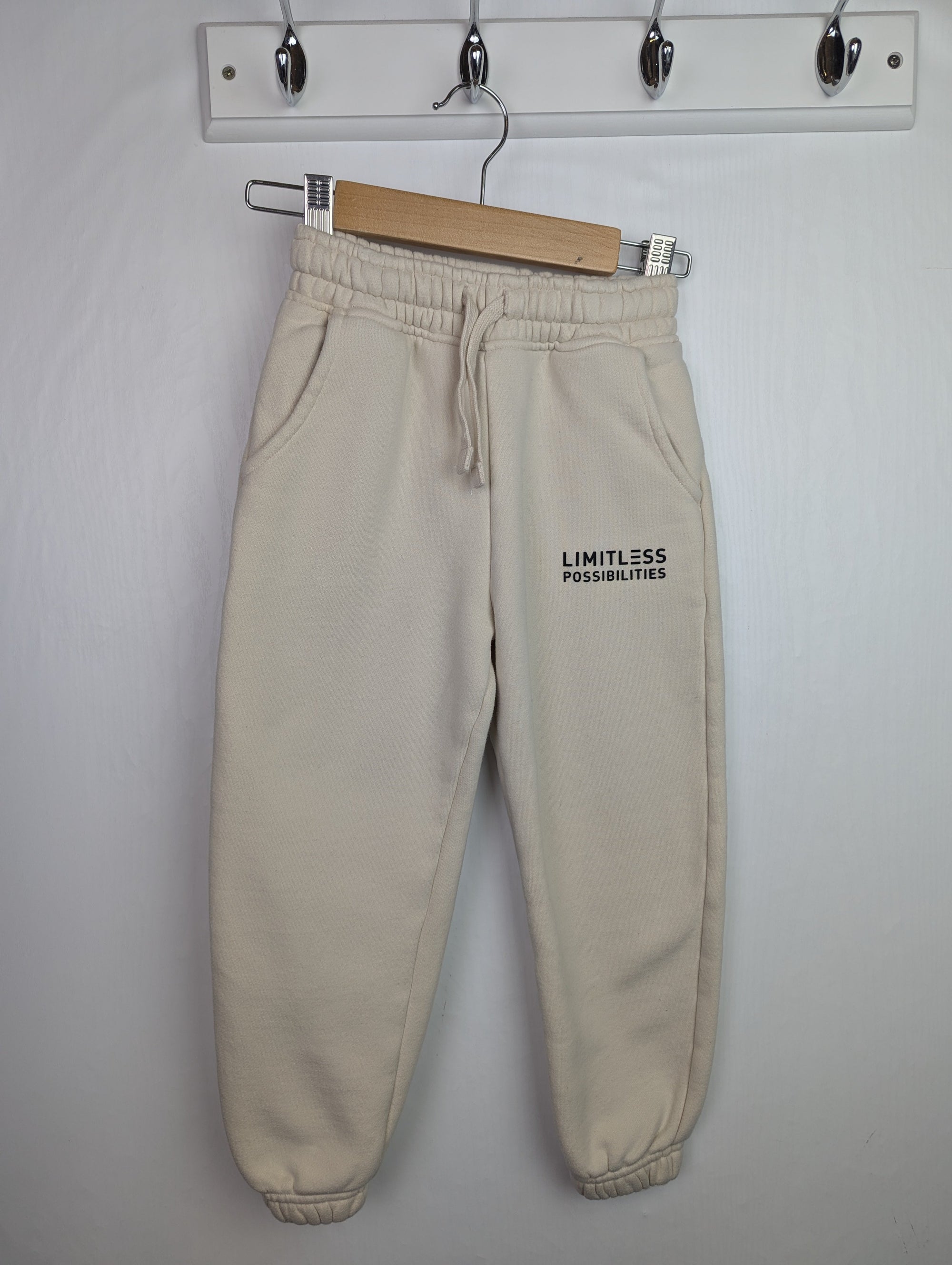 F&F Cream 'Limitless' Joggers - Boys 4 - 5 Years - Little Ones Preloved. Second Hand Children's & Preloved Baby, Kids, Girls & Boys Clothes. UK online