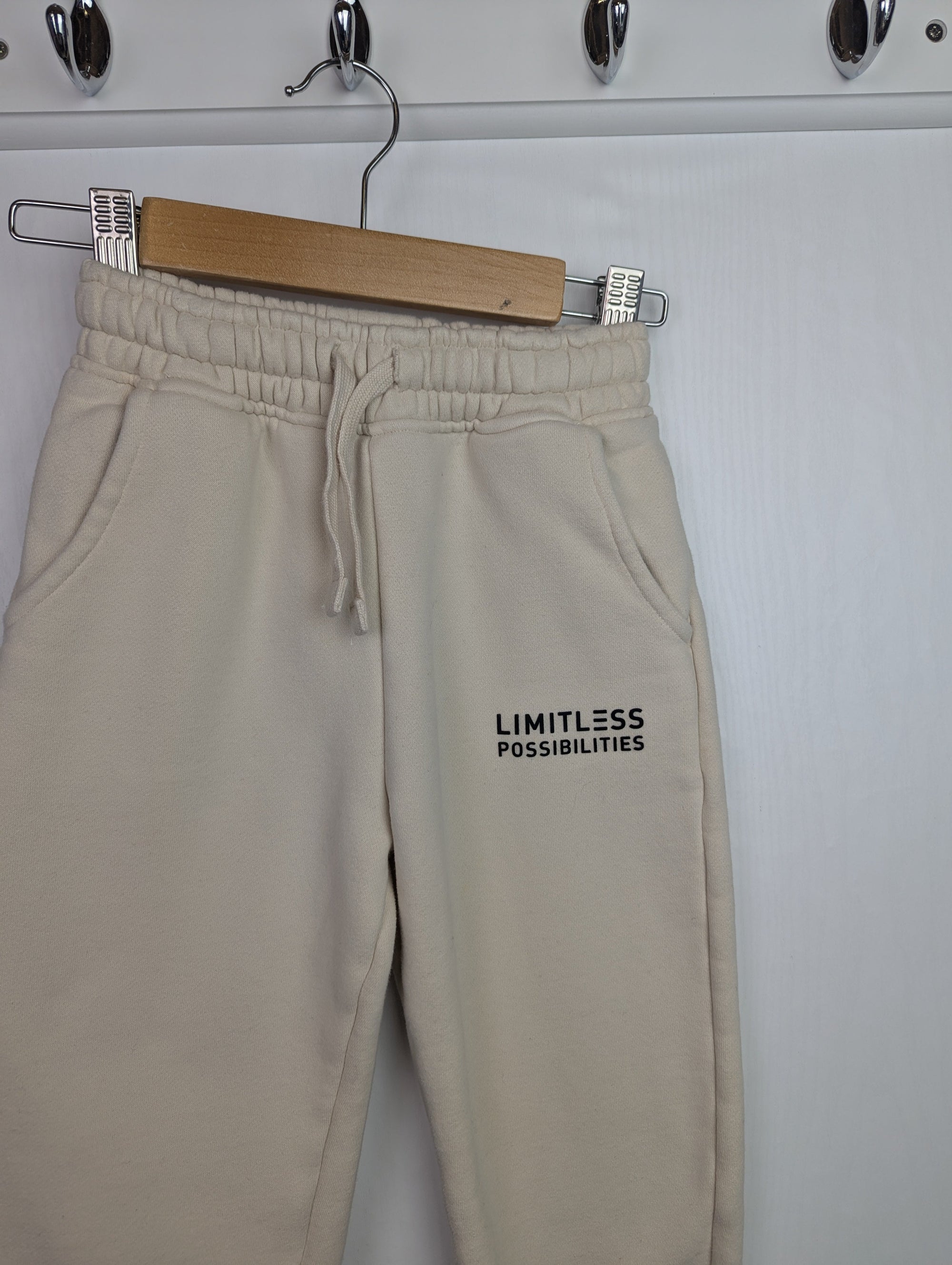 F&F Cream 'Limitless' Joggers - Boys 4 - 5 Years - Little Ones Preloved. Second Hand Children's & Preloved Baby, Kids, Girls & Boys Clothes. UK online