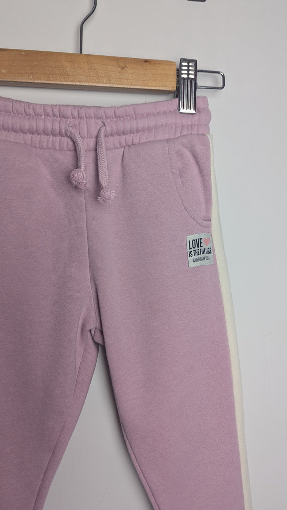 F&F Purple Striped Jogging Bottoms - Girls 3-4 Years Little Ones Preloved Used, Preloved, Preworn & Second Hand Baby, Kids & Children's Clothing UK Online. Cheap affordable. Brands including Next, Joules, Nutmeg Morrisons, TU, F&F, H&M.