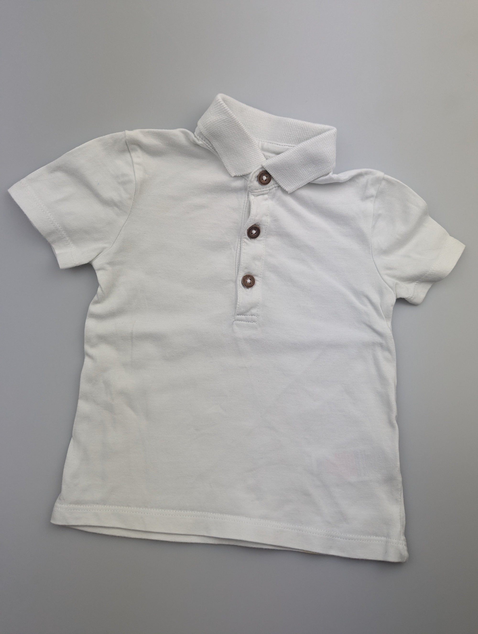 F&F White Top - Boys 6 - 9 Months - Little Ones Preloved. Second Hand Children's & Preloved Baby, Kids, Girls & Boys Clothes. UK online