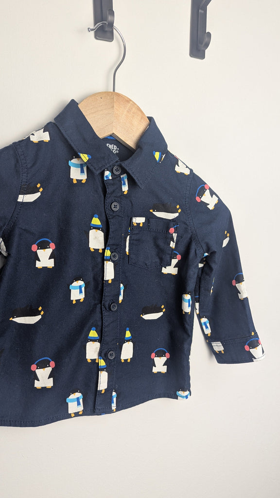 Fred & Flo Navy Penguin Long Sleeve Shirt - Boys 6-9 Months Little Ones Preloved Used, Preloved, Preworn & Second Hand Baby, Kids & Children's Clothing UK Online. Cheap affordable. Brands including Next, Joules, Nutmeg Morrisons, TU, F&F, H&M.