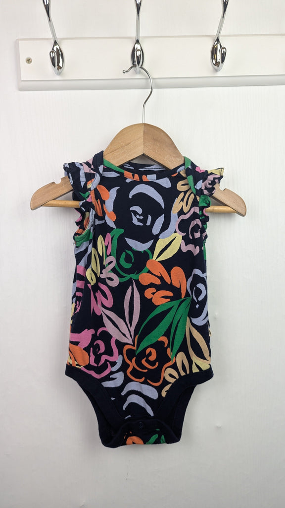 Gap Navy Floral Bodysuit - Girls 6-12 Months Little Ones Preloved Used, Preloved, Preworn & Second Hand Baby, Kids & Children's Clothing UK Online. Cheap affordable. Brands including Next, Joules, Nutmeg Morrisons, TU, F&F, H&M.