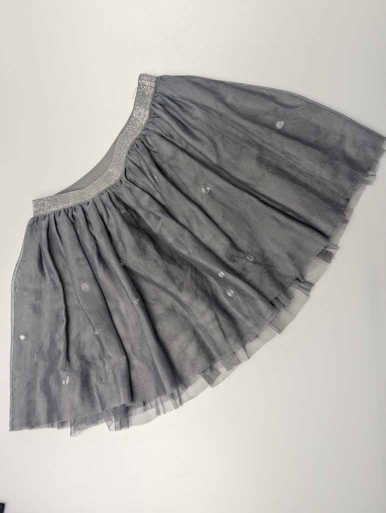 Gap Silver Mesh Skirt - Girls 6-7 Years Little Ones Preloved Used, Preloved, Preworn Baby, Girls & Boys Clothes. Kids & Children's second hand Clothing UK Online. Cheap affordable. Brands including Next, Joules, Nutmeg Morrisons, TU, F&F, H&M.