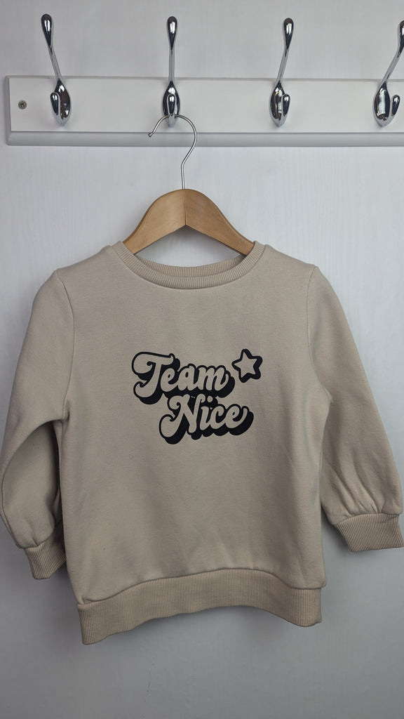 George Beige Team Nice Jumper - Unisex 12-18 Months George Used, Preloved, Preworn & Second Hand Baby, Kids & Children's Clothing UK Online. Cheap affordable. Brands including Next, Joules, Nutmeg Morrisons, TU, F&F, H&M.