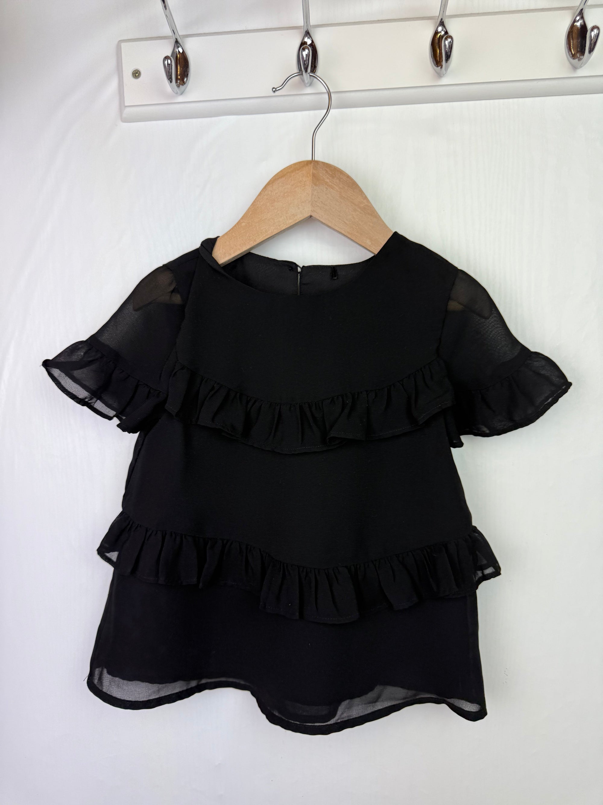 George Black Ruffle Top - Girls 4 - 5 Years - Little Ones Preloved. Second Hand Children's & Preloved Baby, Kids, Girls & Boys Clothes. UK online