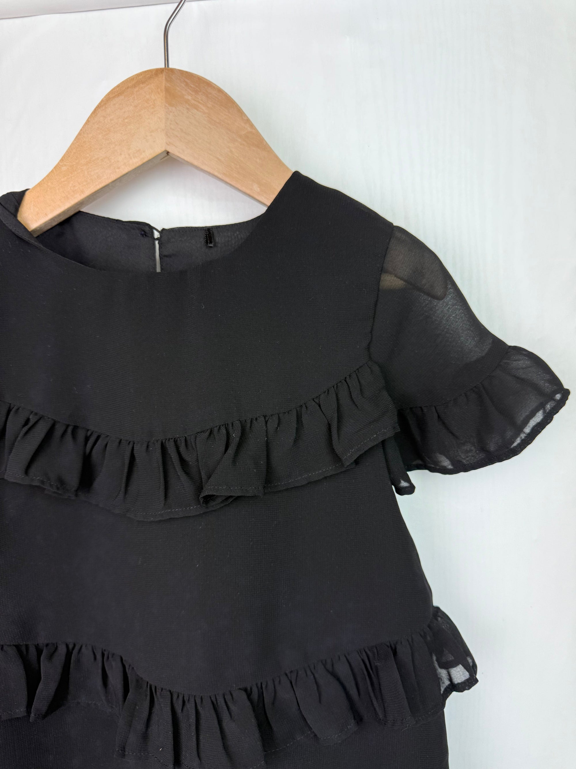 George Black Ruffle Top - Girls 4 - 5 Years - Little Ones Preloved. Second Hand Children's & Preloved Baby, Kids, Girls & Boys Clothes. UK online