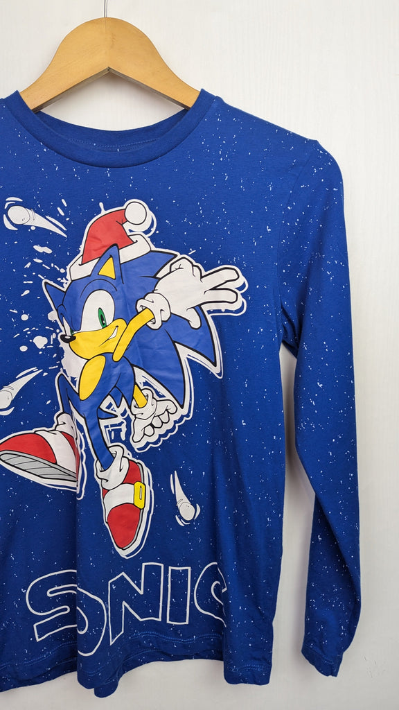 George Christmas Sonic Top - Boys 13-14 Years Little Ones Preloved Used, Preloved, Preworn & Second Hand Baby, Kids & Children's Clothing UK Online. Cheap affordable. Brands including Next, Joules, Nutmeg Morrisons, TU, F&F, H&M.