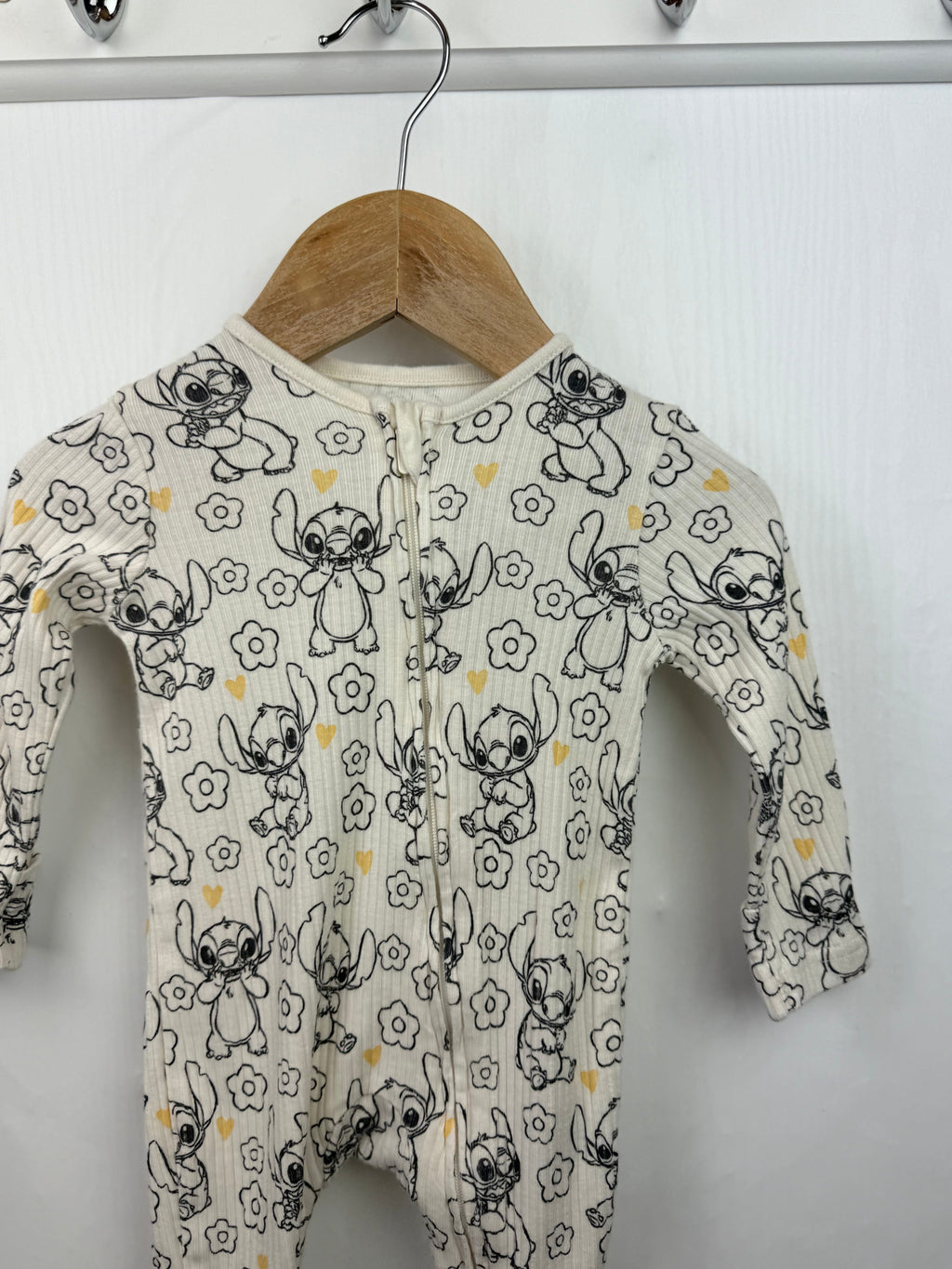 George Disney Stitch Zip Sleepsuit - Girls 0 - 3 Months - Little Ones Preloved. Second Hand Children's & Preloved Baby, Kids, Girls & Boys Clothes. UK online