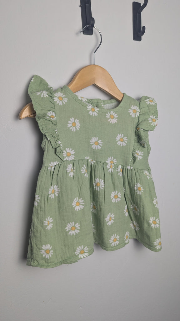 George Green Floral Sleeveless Top - Girls 9-12 Months Little Ones Preloved Used, Preloved, Preworn & Second Hand Baby, Kids & Children's Clothing UK Online. Cheap affordable. Brands including Next, Joules, Nutmeg Morrisons, TU, F&F, H&M.