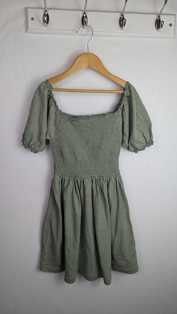 George Green Shirred Dress - Girls 6-7 Years Little Ones Preloved Used, Preloved, Preworn Baby, Girls & Boys Clothes. Kids & Children's second hand Clothing UK Online. Cheap affordable. Brands including Next, Joules, Nutmeg Morrisons, TU, F&F, H&M.