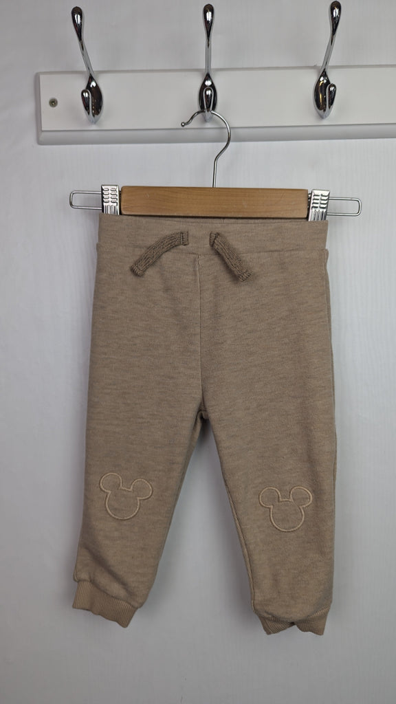 George Mickey Mouse Beige Joggers - Boys 6-9 Months Little Ones Preloved Used, Preloved, Preworn & Second Hand Baby, Kids & Children's Clothing UK Online. Cheap affordable. Brands including Next, Joules, Nutmeg Morrisons, TU, F&F, H&M.