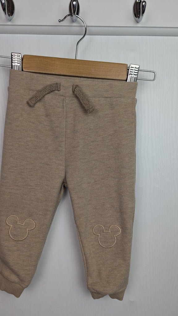 George Mickey Mouse Beige Joggers - Boys 6-9 Months Little Ones Preloved Used, Preloved, Preworn & Second Hand Baby, Kids & Children's Clothing UK Online. Cheap affordable. Brands including Next, Joules, Nutmeg Morrisons, TU, F&F, H&M.